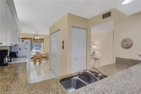 Kitchen - 4310 Chantelle Dr #E102, Naples, FL 34112 photo 3 of 3