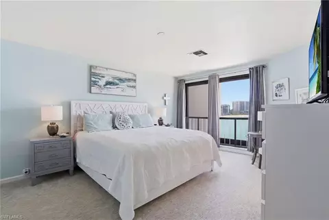 Bedroom - 309 La Peninsula Blvd #309, Naples, FL 34113 photo 1 of 6