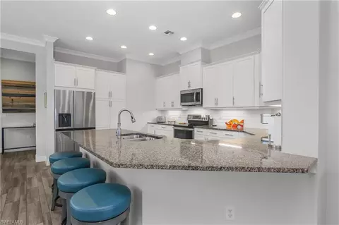 Kitchen - 6907 Cay Ct, Naples, FL 34113 photo 5 of 7