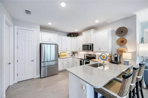 Kitchen - 1036 Tranquil Brook Dr, Naples, FL 34114 photo 2 of 3