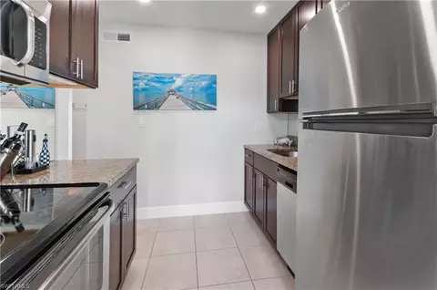 Kitchen - 680 12th Ave S #680, Naples, FL 34102 photo 1 of 2
