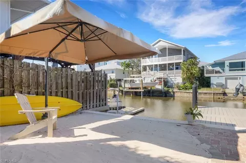 Exterior - 1293 Rainbow Ct, Naples, FL 34110 photo 6 of 14