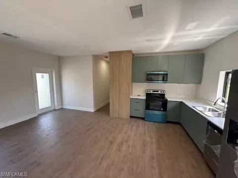 Living - 1907 E 15th St, Lehigh Acres, FL 33972 photo 2 of 2