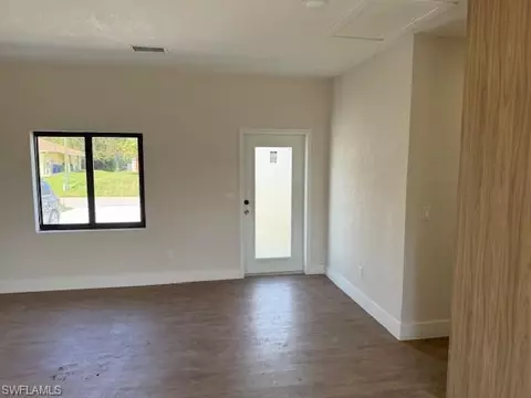 Living - 1907 E 15th St, Lehigh Acres, FL 33972 photo 1 of 2