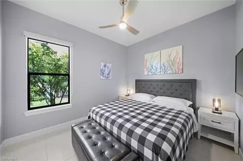 Bedroom - 9400 Montelanico Loop, Naples, FL 34119 photo 4 of 5