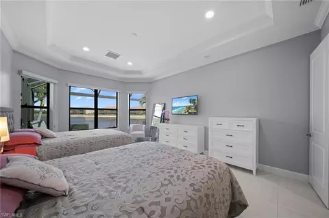 Bedroom - 9400 Montelanico Loop, Naples, FL 34119 photo 2 of 5