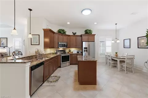 Kitchen - 7587 Moorgate Point Way, Naples, FL 34113 photo 1 of 9