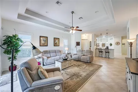 Living - 7587 Moorgate Point Way, Naples, FL 34113 photo 2 of 3