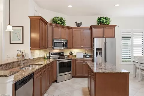 Kitchen - 7587 Moorgate Point Way, Naples, FL 34113 photo 2 of 9