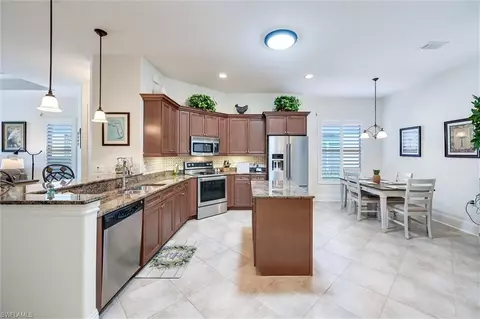 Kitchen - 7587 Moorgate Point Way, Naples, FL 34113 photo 6 of 9