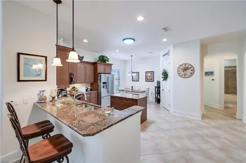 Kitchen - 7587 Moorgate Point Way, Naples, FL 34113 photo 3 of 9