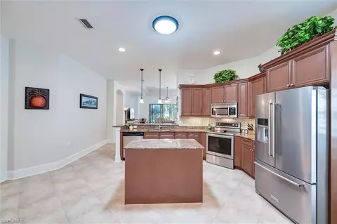 Kitchen - 7587 Moorgate Point Way, Naples, FL 34113 photo 8 of 9