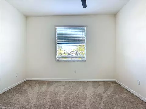 Bedroom - 19890 Beverly Park Rd, Estero, FL 33928 photo 2 of 8