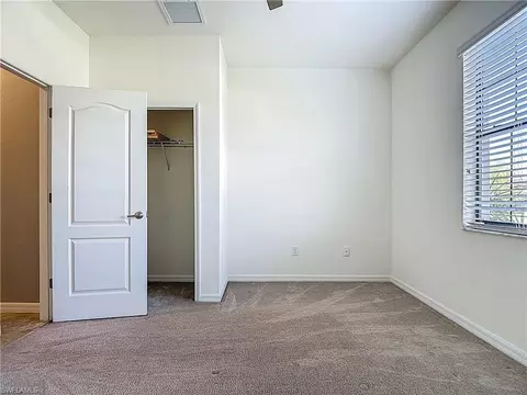 Bedroom - 19890 Beverly Park Rd, Estero, FL 33928 photo 3 of 8