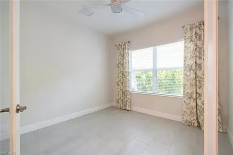 Bedroom - 2409 Ariane Dr, Naples, FL 34112 photo 1 of 4