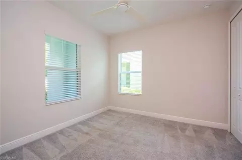 Bedroom - 2409 Ariane Dr, Naples, FL 34112 photo 2 of 4