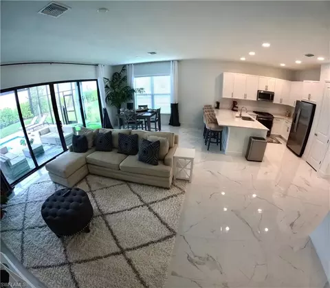 Living - 12830 Hawkins Dr, Estero, FL 33928 photo 1 of 2