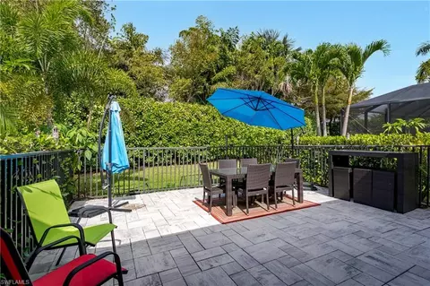 Exterior - 14943 Edgewater Cir, Naples, FL 34114 photo 1 of 17