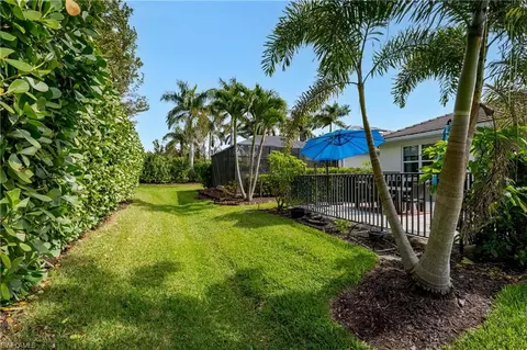 Exterior - 14943 Edgewater Cir, Naples, FL 34114 photo 5 of 17