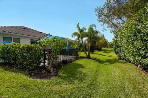 Exterior - 14943 Edgewater Cir, Naples, FL 34114 photo 6 of 17