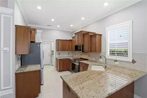 Kitchen - 6039 Fairway Ct, Naples, FL 34110 photo 1 of 2
