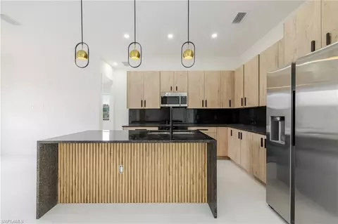 Kitchen - 1211 Cloplon St E, Lehigh Acres, FL 33974 photo 1 of 5