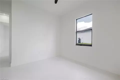 Bedroom - 1211 Cloplon St E, Lehigh Acres, FL 33974 photo 5 of 8