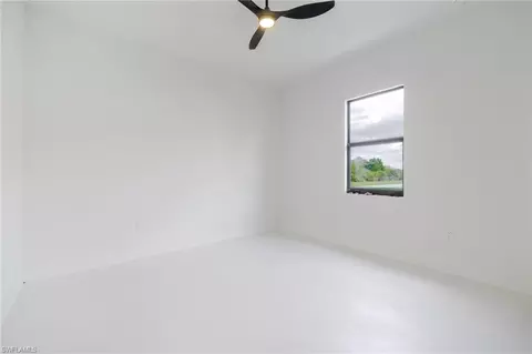 Bedroom - 1211 Cloplon St E, Lehigh Acres, FL 33974 photo 6 of 8