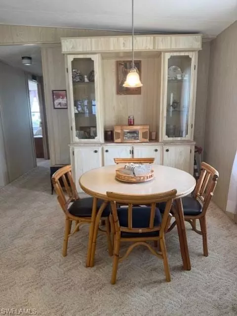 Dining - 210 Pine Key Ln #210, Naples, FL 34114 photo 1 of 2