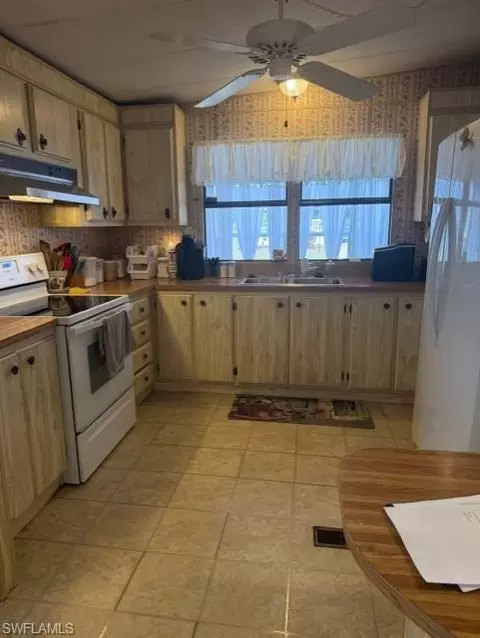 Kitchen - 210 Pine Key Ln #210, Naples, FL 34114 photo 1 of 3