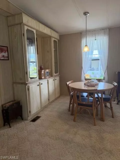 Dining - 210 Pine Key Ln #210, Naples, FL 34114 photo 2 of 2