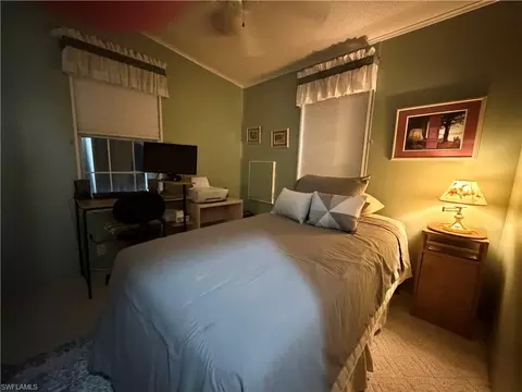 Bedroom - 4621 Liberty Ln E, Estero, FL 33928 photo 1 of 5