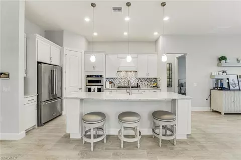 7631 Winding Cypress Dr, Naples, FL 34114 photo 14