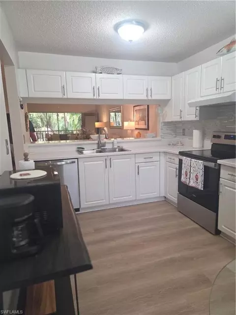 Kitchen - 3531 County Barn Rd #C201, Naples, FL 34112 photo 2 of 3