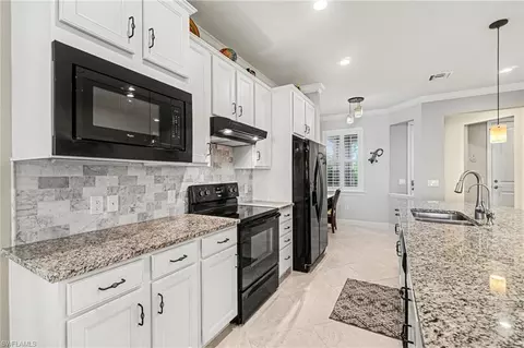 Kitchen - 20317 Corkscrew Shores Blvd, Estero, FL 33928 photo 5 of 8
