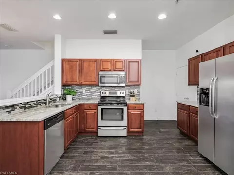 Kitchen - 15620 Marcello Cir #160, Naples, FL 34110 photo 3 of 4