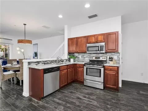 Kitchen - 15620 Marcello Cir #160, Naples, FL 34110 photo 4 of 4