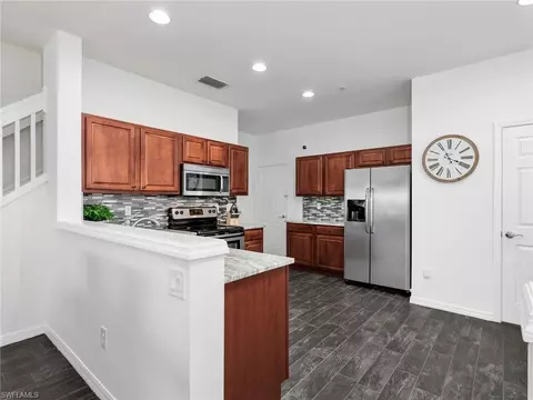 Kitchen - 15620 Marcello Cir #160, Naples, FL 34110 photo 1 of 4