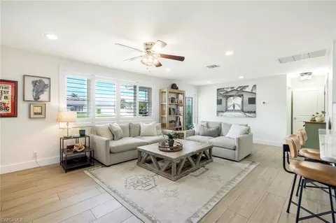 Living - 20621 Pine Tree Ln, Estero, FL 33928 photo 2 of 2