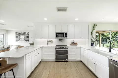 Kitchen - 20621 Pine Tree Ln, Estero, FL 33928 photo 2 of 3
