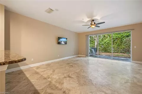 Living - 15715 Marcello Cir, Naples, FL 34110 photo 1 of 7