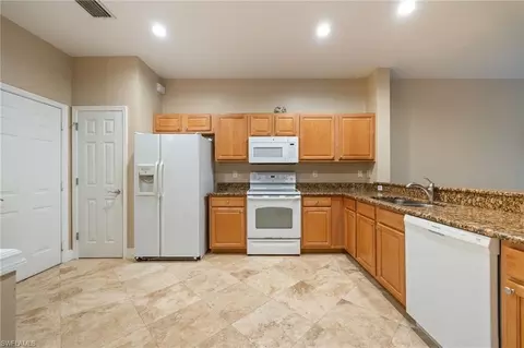 Kitchen - 15715 Marcello Cir, Naples, FL 34110 photo 1 of 2