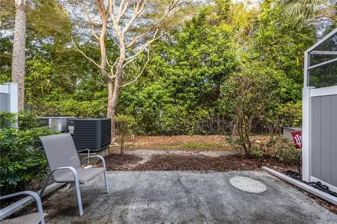 Exterior - 15715 Marcello Cir, Naples, FL 34110 photo 4 of 7