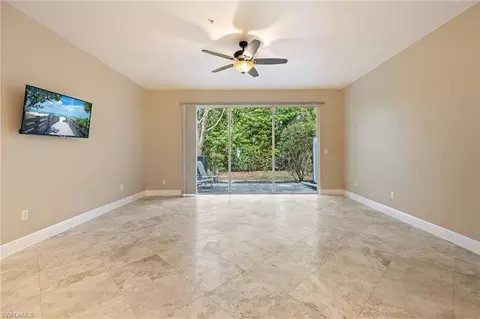 Living - 15715 Marcello Cir, Naples, FL 34110 photo 2 of 7