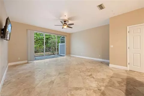 Living - 15715 Marcello Cir, Naples, FL 34110 photo 3 of 7