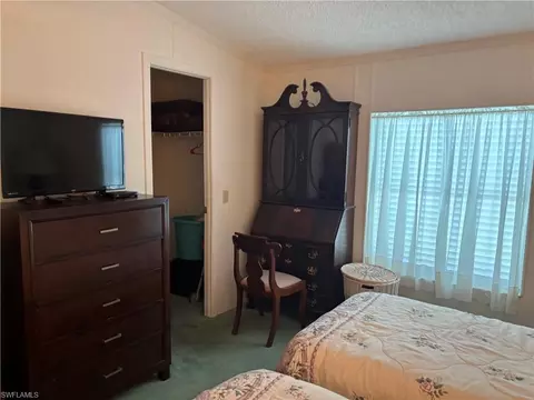 Bedroom - 49 Turquoise Ave #49T, Naples, FL 34114 photo 2 of 4