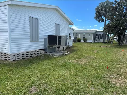 Exterior - 49 Turquoise Ave #49T, Naples, FL 34114 photo 2 of 3