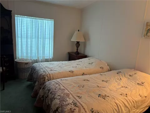 Bedroom - 49 Turquoise Ave #49T, Naples, FL 34114 photo 1 of 4