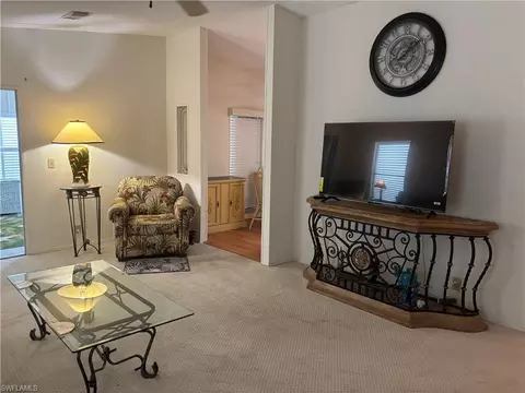 Living - 49 Turquoise Ave #49T, Naples, FL 34114 photo 2 of 2