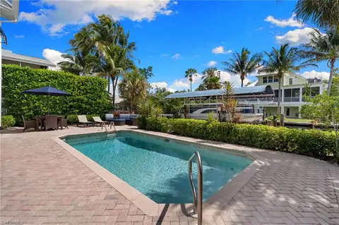 Exterior - 1286 Rainbow Ct, Naples, FL 34110 photo 8 of 13